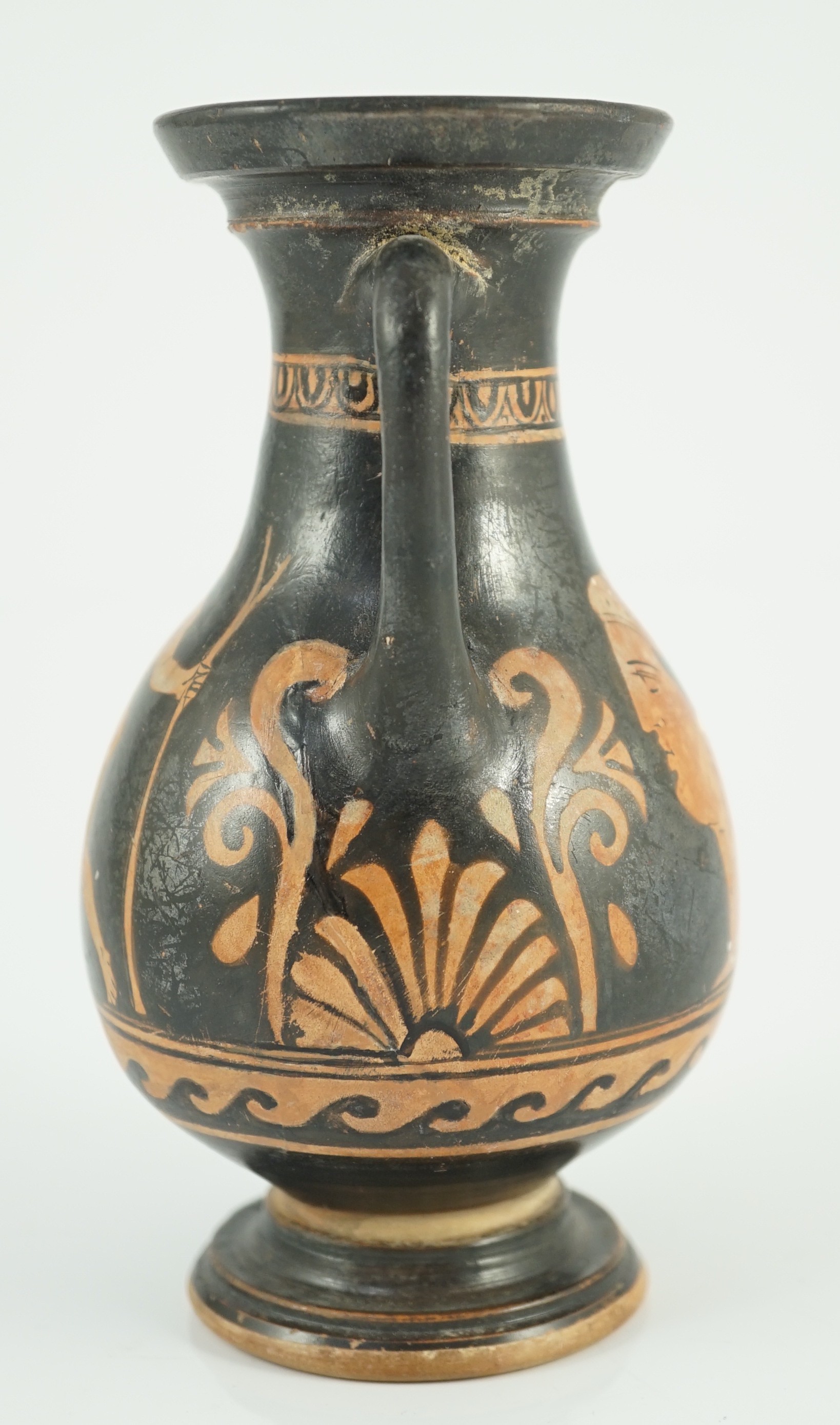 An Apulian red figure Pelike, 4th century BCE., 15.3cm high, restored